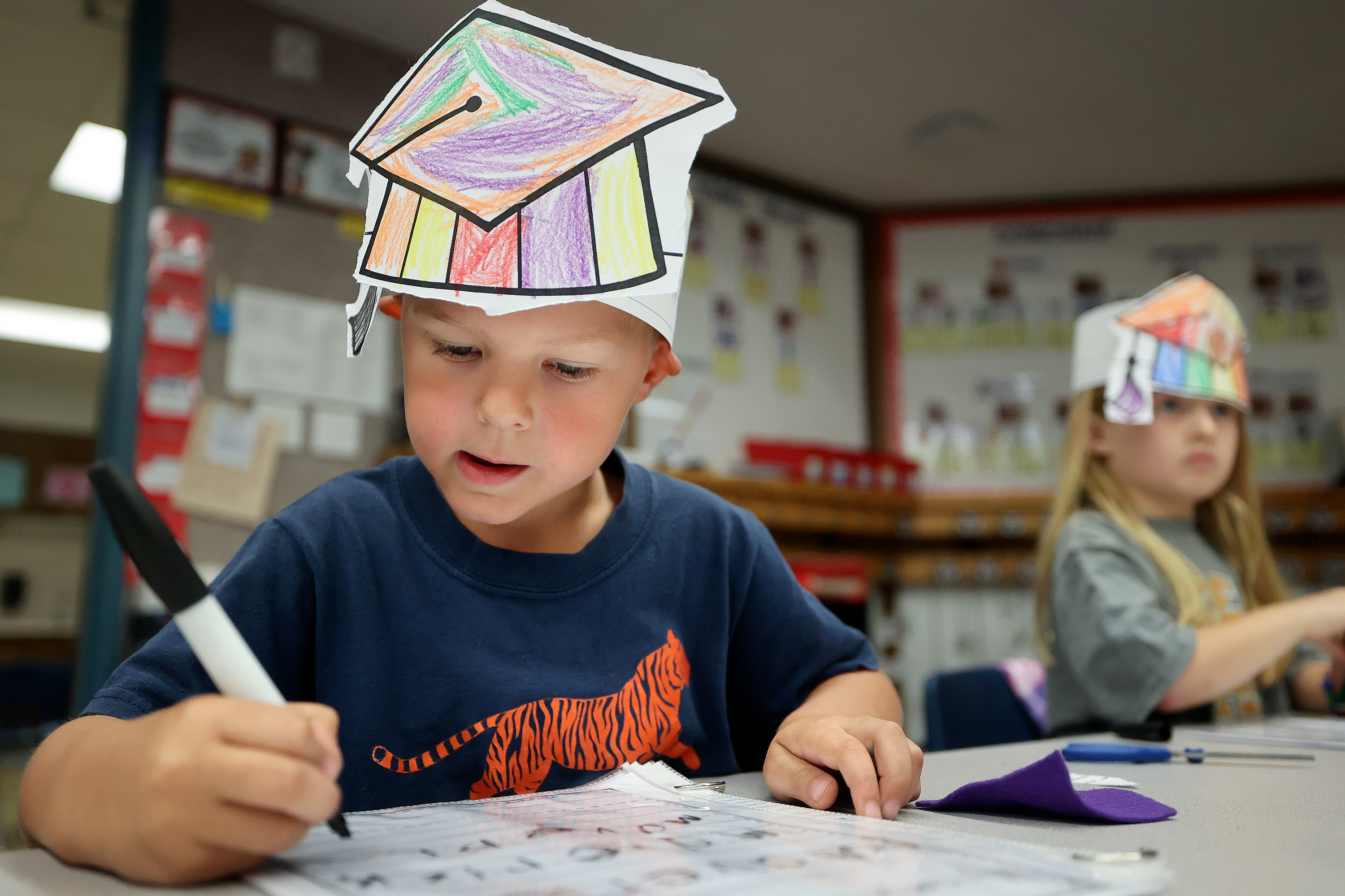 Kindergartner Maverick Hill practices writing his name during Kindergarten College-Ready Day at Ridgecrest Elementary School in Cottonwood Heights on Friday.