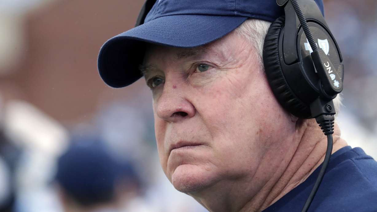 FILE - North Carolina coach Mack Brown watches as the team prepares for an NCAA college football game against Virginia Tech in Chapel Hill, N.C., Oct. 1, 2022. Brown is calling out the NCAA for dragging its heels on the case of transfer wide receiver Devontez Walker, who has not yet been ruled eligible.