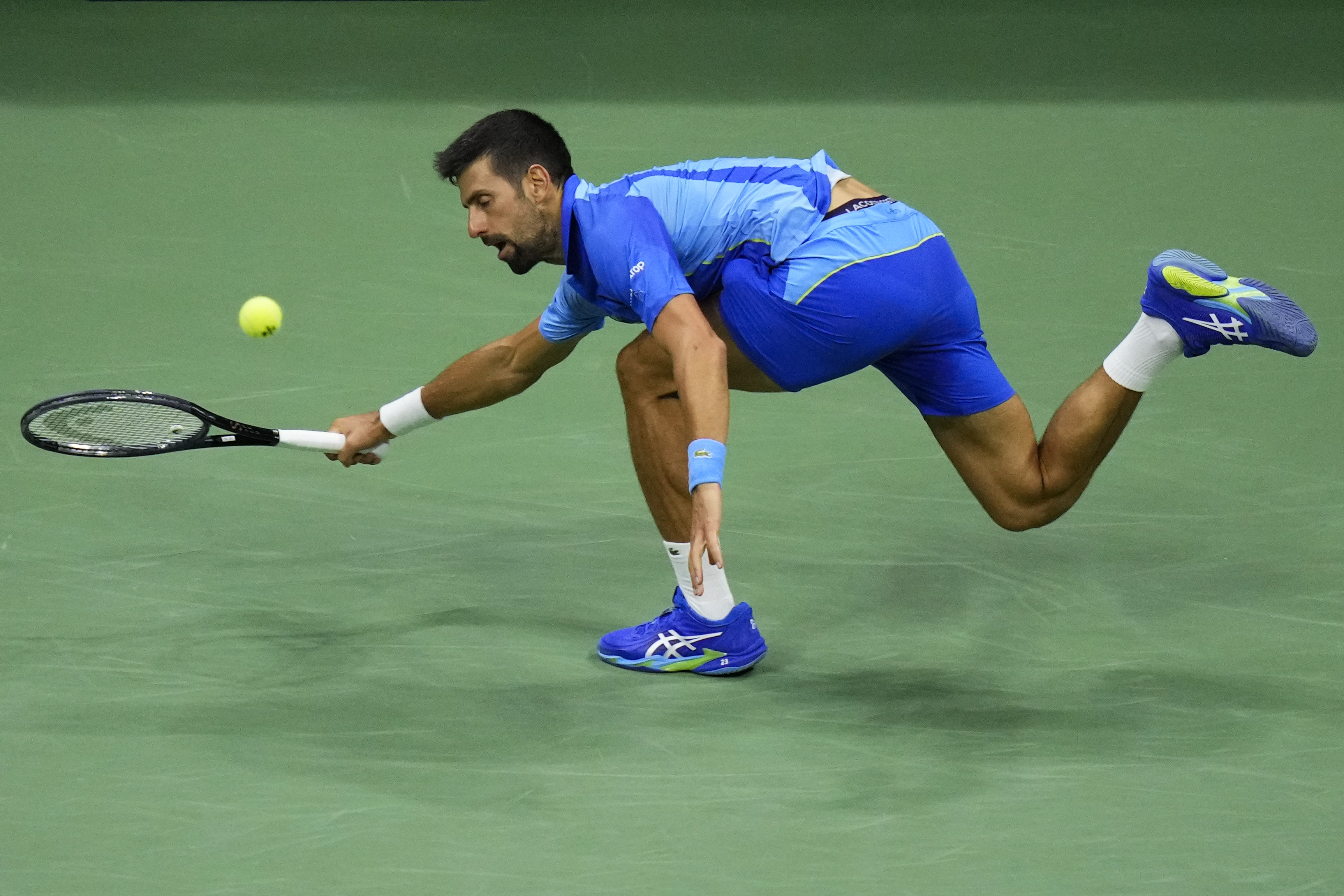 Novak Djokovic, of Serbia, returns a shot to Laslo Djere, of Serbia, during the third round of the U.S. Open tennis championships, Friday, Sept. 1, 2023, in New York. 