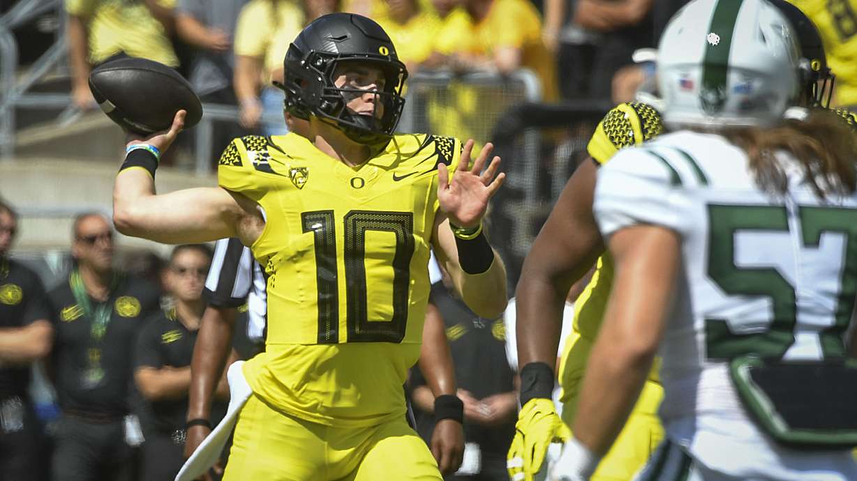 Oregon quarterback Bo Nix (10) passes the ball during the first half of an NCAA college football game Saturday, Sept. 2, 2023, in Eugene, Ore.
