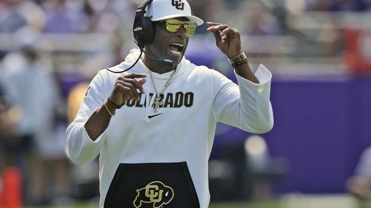 Colorado head coach Deion Sanders yells from the sidelines during the first half of an NCAA college football game against TCU Saturday, Sept. 2, 2023, in Fort Worth, Texas.
