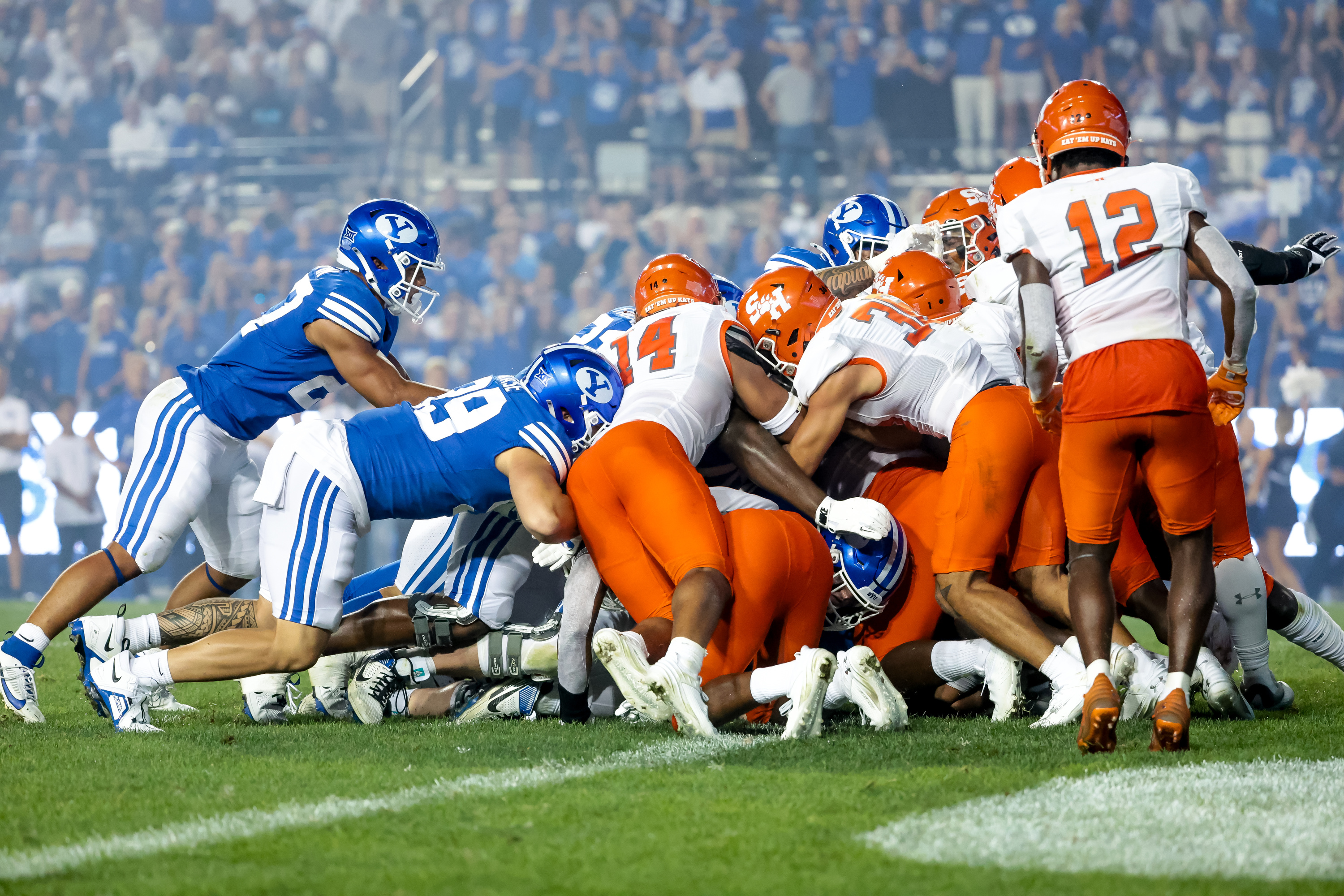 BYU quarterback Kedon Slovis (10) fights his way from the 1-yard-line to score, putting the Cougars up 14-0 after the PAT, during the game against the Sam Houston Bearkats at LaVell Edwards Stadium in Provo on Saturday, Sept. 2, 2023.