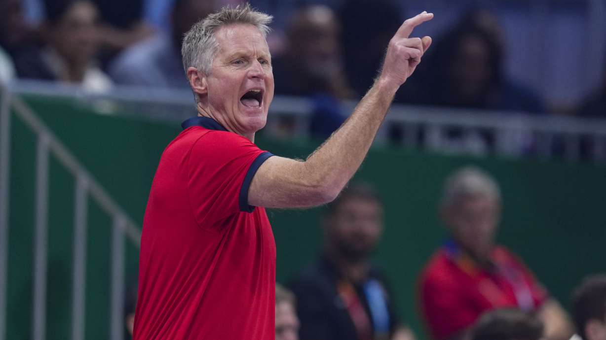 U.S. head coach Steve Kerr calls a play for his team as they player against Lithuania during the first half of a Basketball World Cup second-round match in Manila, Philippines Sunday, Sept. 3, 2023.