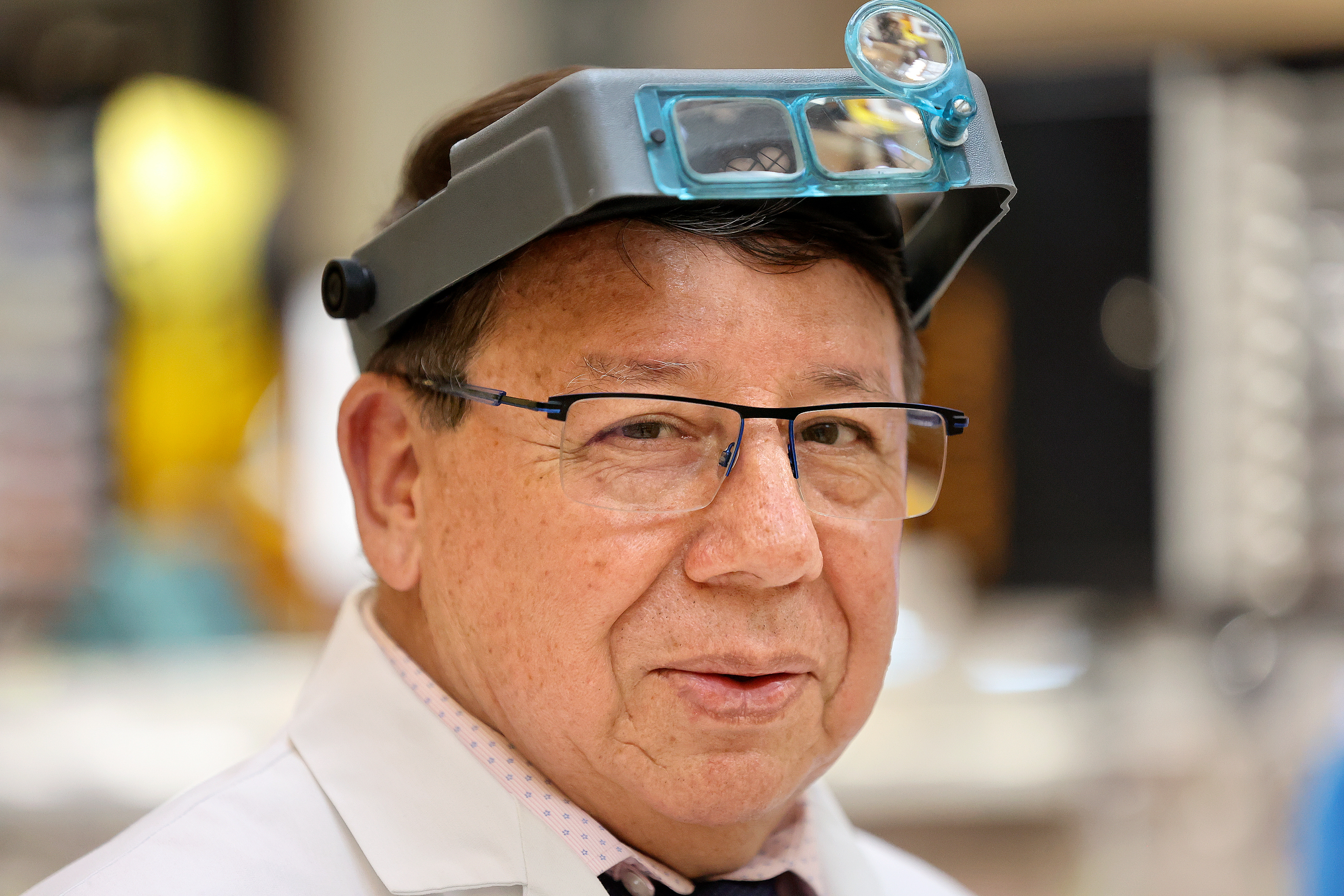 Marcelo Sandivar, certified watch technician and owner of Fashion Watch & Clock, poses for a portrait at the company's kiosk in Fashion Place Mall in Murray on Aug. 24.