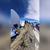 Have You Seen This? Mountain climber inches along ledge of highest peak in European Union