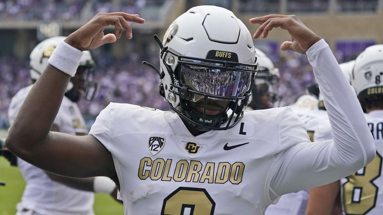 Colorado quarterback Shedeur Sanders (2) celebrates a touchdown during the first half of an NCAA college football game against TCU Saturday, Sept. 2, 2023, in Fort Worth, Texas.