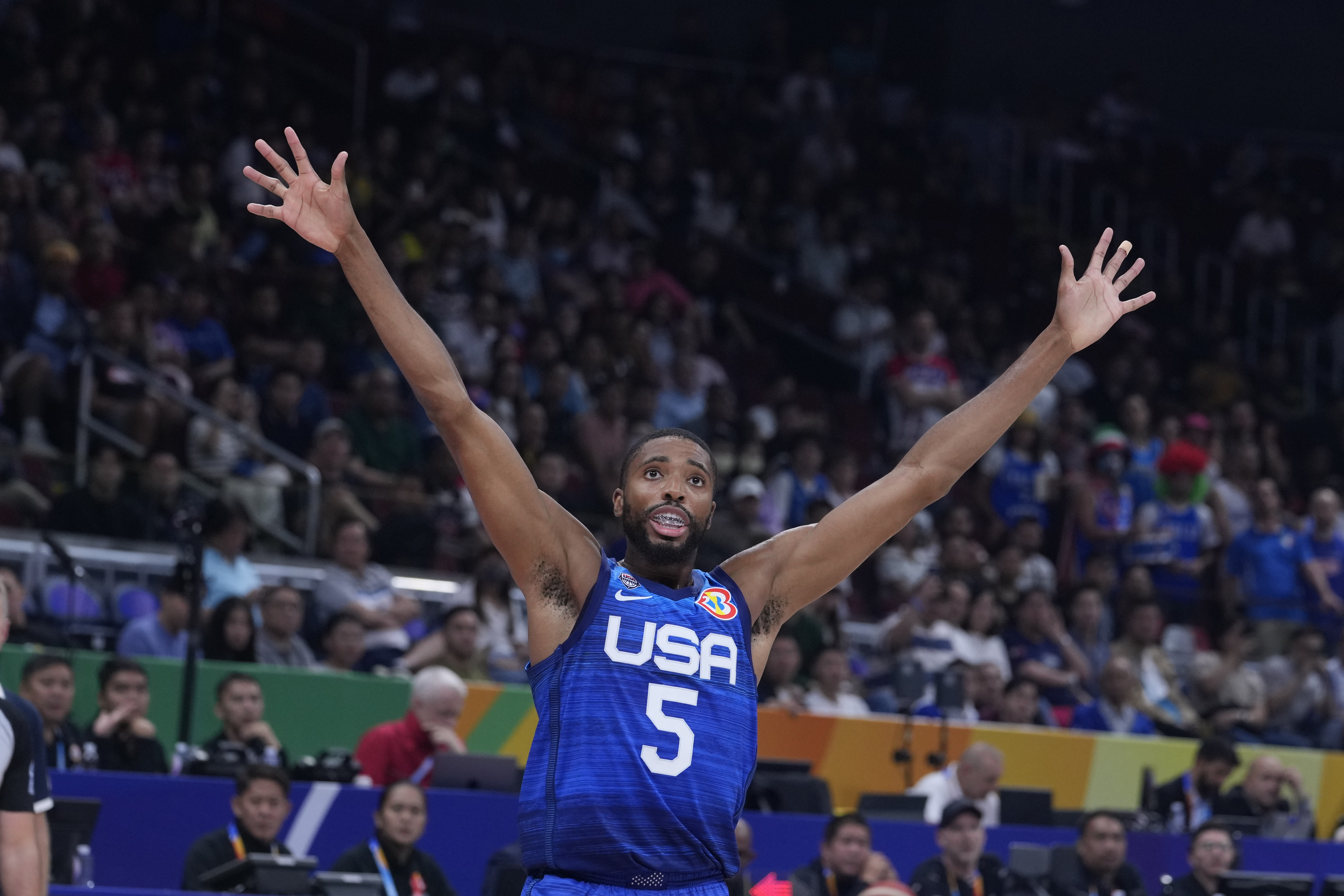 U.S. forward Mikal Bridges (5) gestures during the Basketball World Cup quarterfinal game between Italy and U.S. at the Mall of Asia Arena in Manila, Philippines, Saturday, Aug. 31, 2023. 