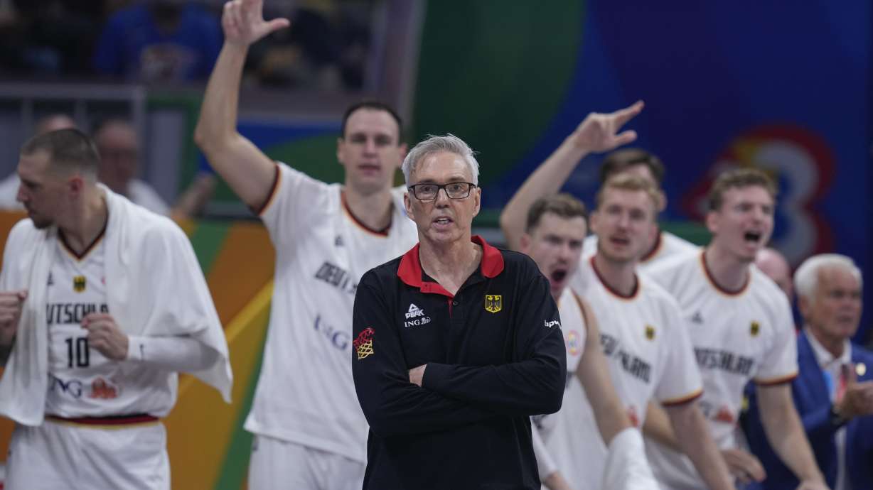 Germany coach Gordie Herbert watches play during the Basketball World Cup quarterfinal between Germany and Latvia in Manila, Philippines, Wednesday, Sept. 6, 2023.