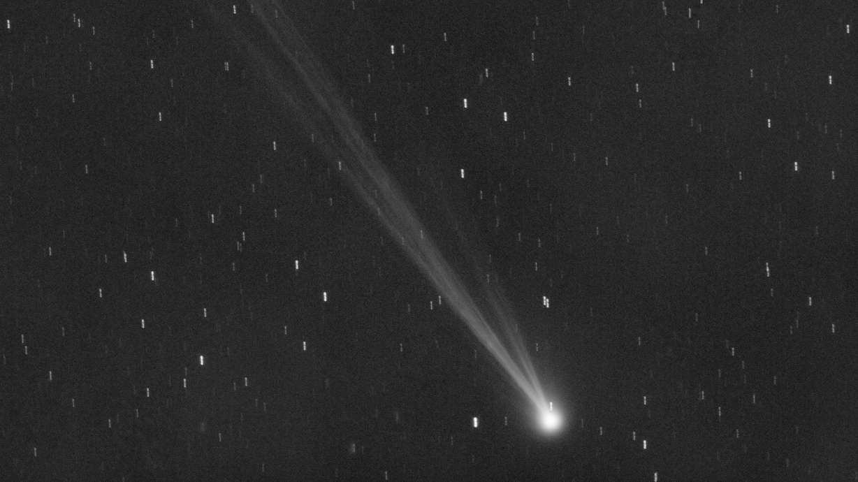 Comet C/2023 P1 Nishimura and its tail are seen from Manciano, Italy, Tuesday. Stargazers across the Northern Hemisphere should catch a glimpse as soon as possible because it will be another 400 years before the wandering ice ball returns.