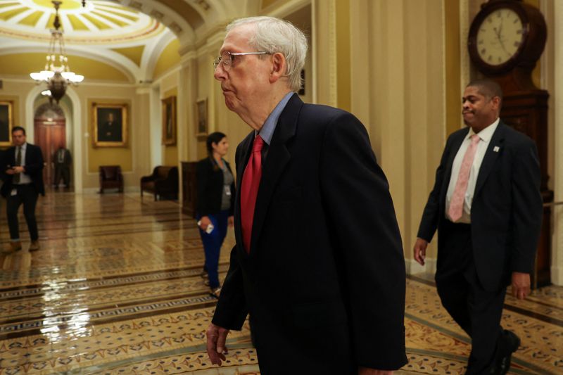 U.S. Senate Minority Leader Mitch McConnell, R-Ky., walks to the Senate floor amid ongoing talks over government funding, as the threat of an October government shutdown looms on Capitol Hill in Washington on Wednesday.