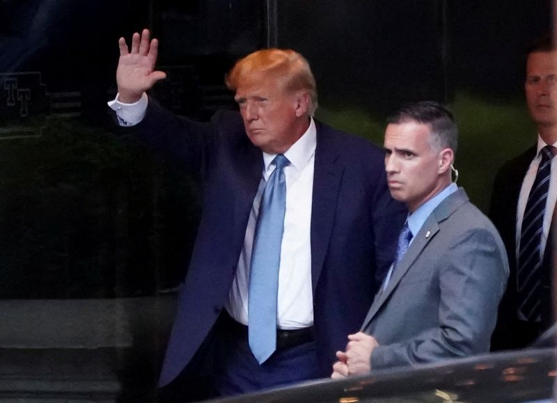 Former U.S. President Donald Trump arrives at Trump Tower in New York City, April 13. A Georgia judge on Wednesday said he was "very skeptical" that Trump and 18 co-defendants could stand trial together as soon as next month.