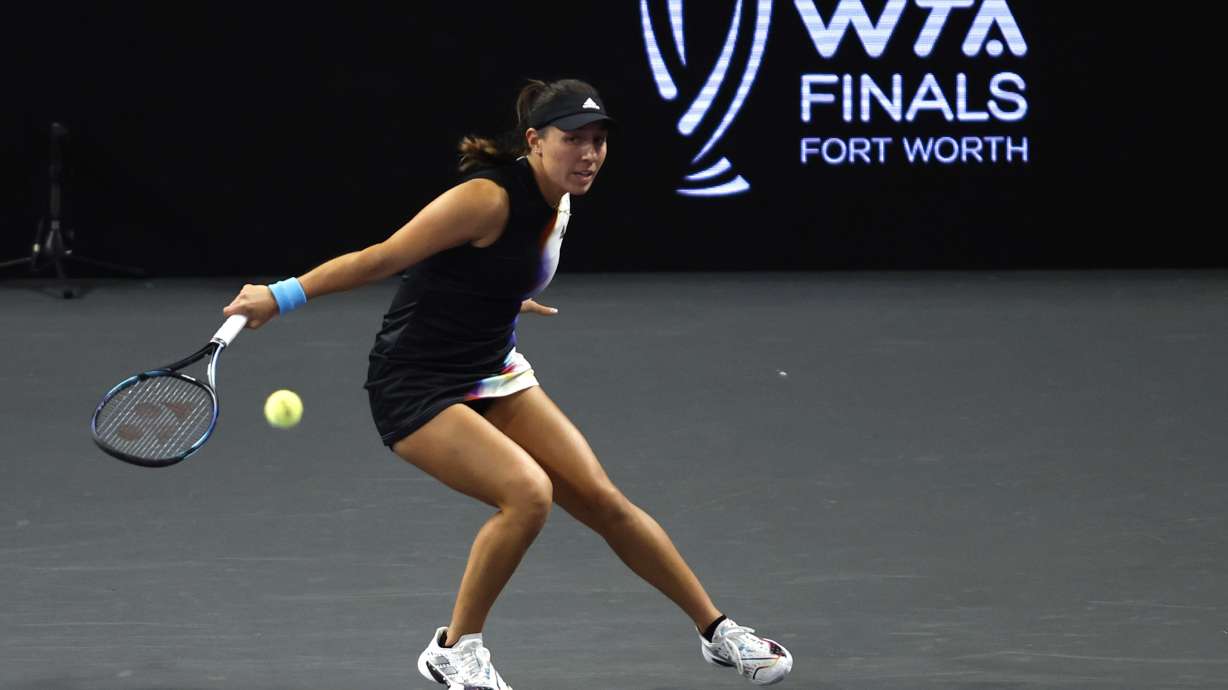 FILE - Jessica Pegula, of the United States, returns a shot to Ons Jabeur, of Tunisia, during round-robin play on day three of the WTA Finals tennis tournament in Fort Worth, Texas, Wednesday, Nov. 2, 2022. The women’s tennis tour will hold the WTA Finals in Cancun, Mexico, from Oct. 29 to Nov. 5, finally finding a site for the season-ending event that has shifted cities repeatedly.