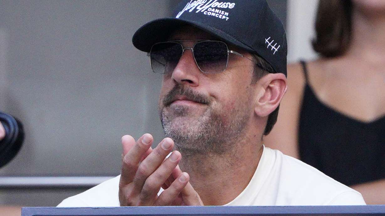 New York Jets quarterback Aaron Rodgers watches Coco Gauff, of the United States, face Caroline Wozniacki, of Denmark, during the fourth round of the U.S. Open tennis championships, Sunday, Sept. 3, 2023, in New York.