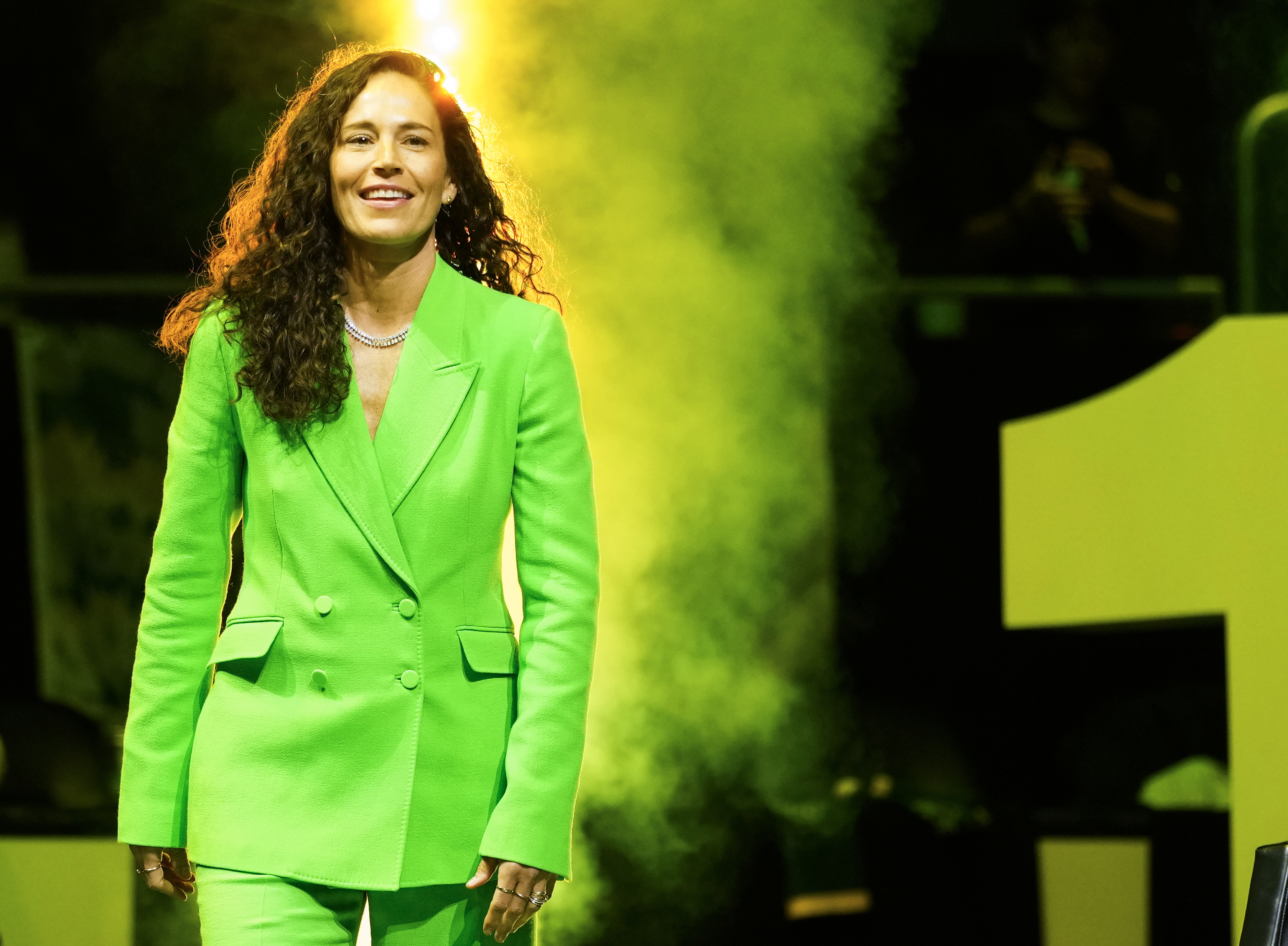 FILE - Former Seattle Storm guard Sue Bird arrives during her jersey retirement ceremony following a WNBA basketball game between the Seattle Storm and the Washington Mystics, on June 11, 2023, in Seattle. Retired U.S. women's basketball player Sue Bird was introduced Friday Sept. 8, 2023 as the global ambassador for the 2026 Women's World Cup. Bird won nine Olympic and World Cup gold medals in a two-decade career with the U.S. women's program. 