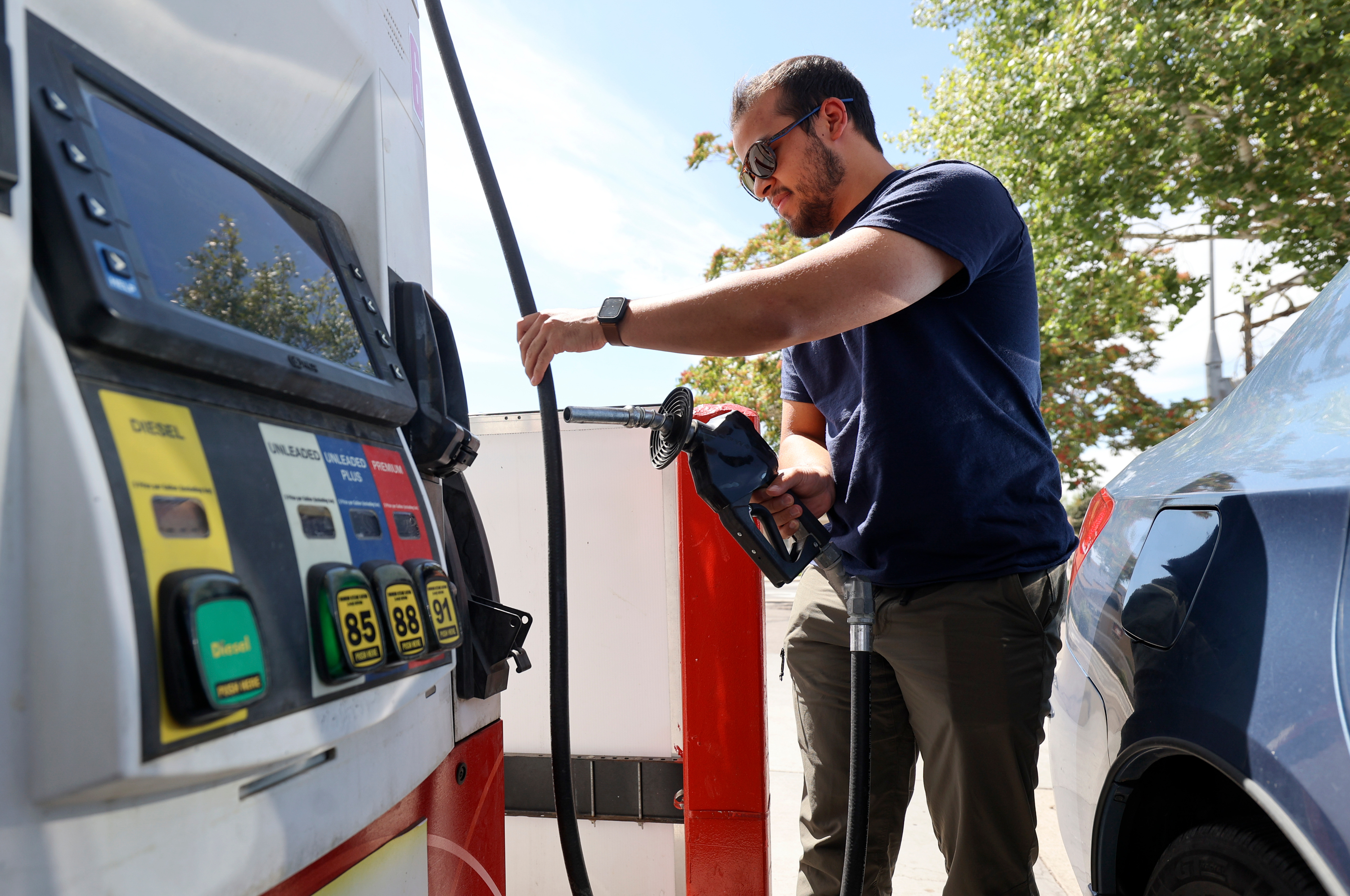 Noah Funtanilla gets gas at Speedway in Salt Lake City on Aug. 7. For the first time since February, Utah's consumer sentiment fell significantly in August.