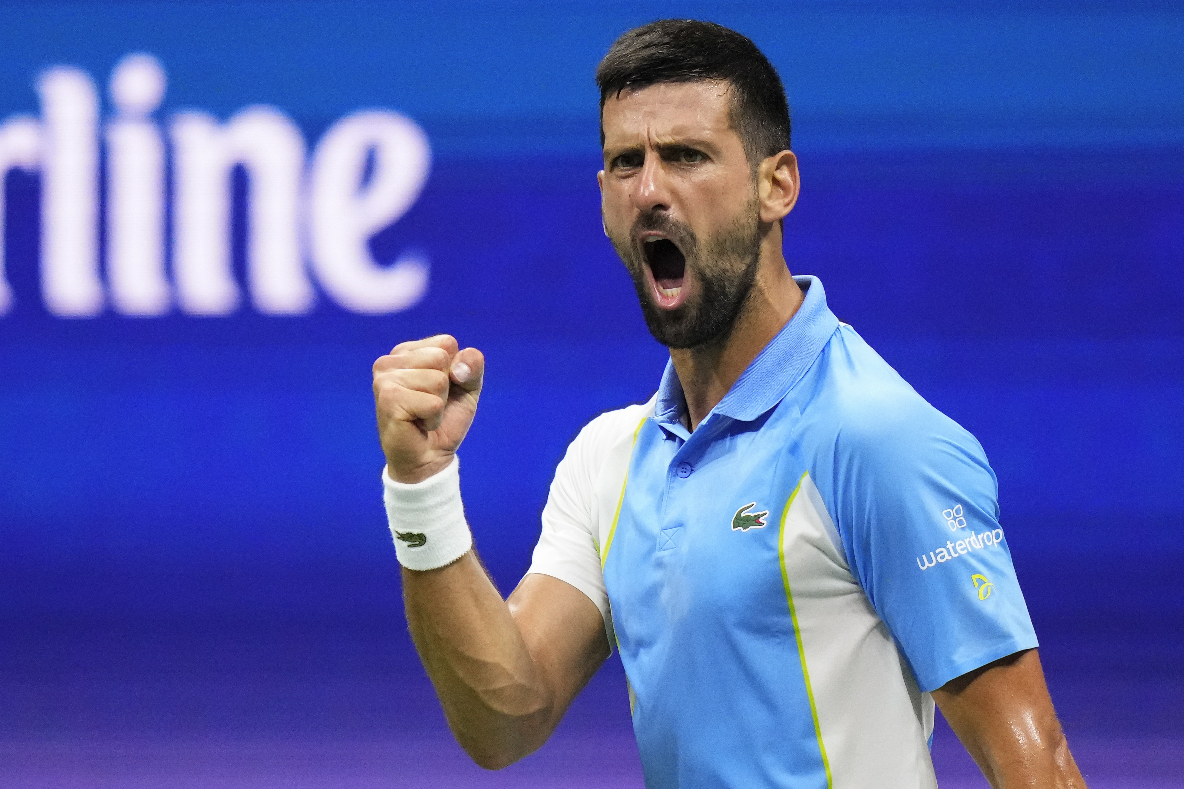 Novak Djokovic, of Serbia, reacts during a match against Ben Shelton, of the United States, during the men's singles semifinals of the U.S. Open tennis championships, Friday, Sept. 8, 2023, in New York. 