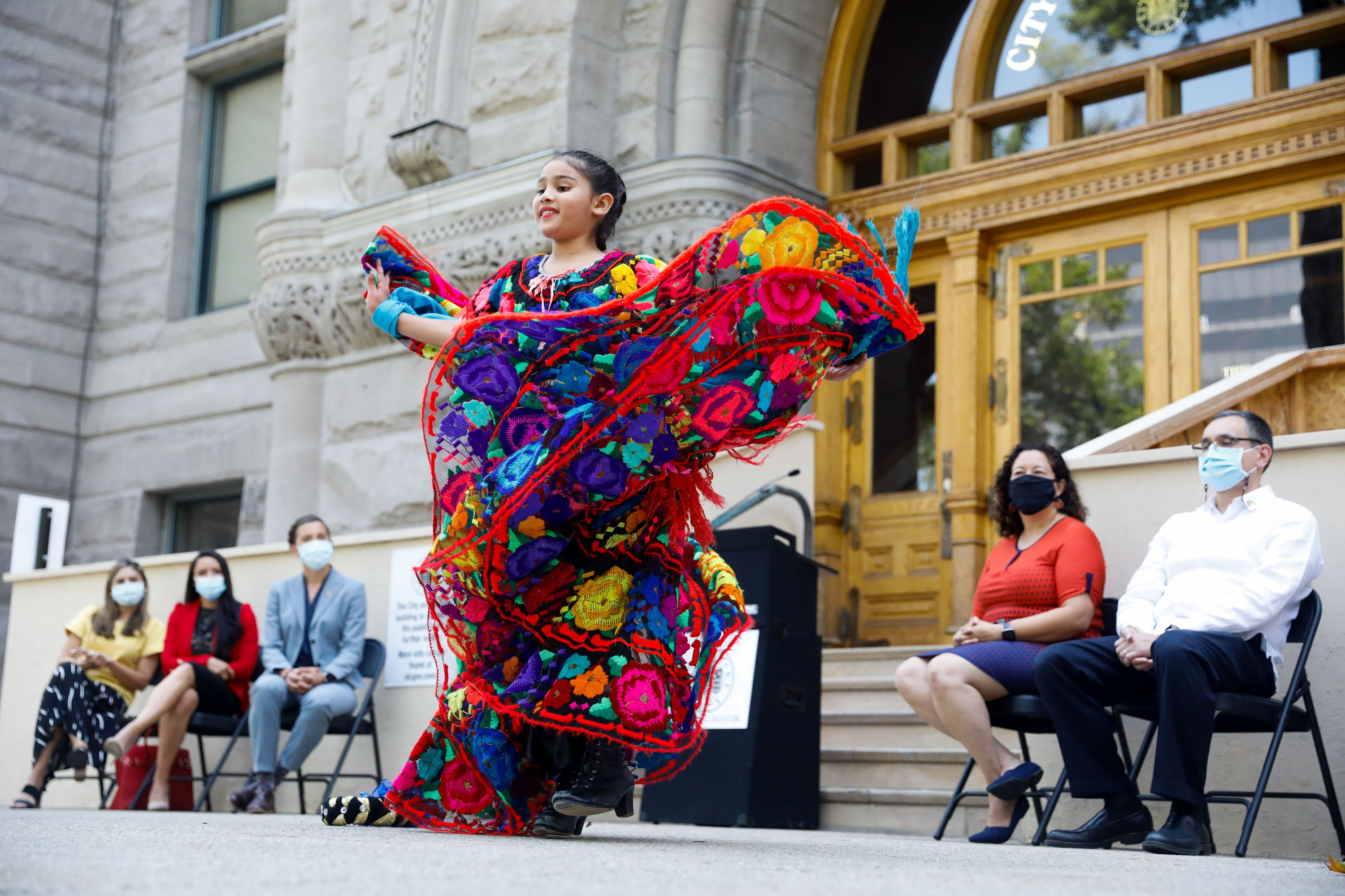 Mili Silos, 11, performs a traditional ballet folklorico at the Salt Lake City-County Building to mark the beginning of Hispanic Heritage Month on Sept. 15, 2021. Utah festivities this year will kick off Saturday and extend through October.