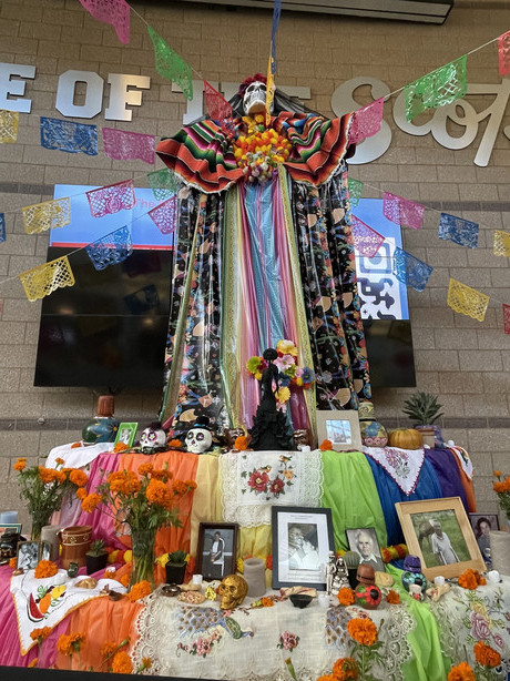 A community ofrenda, or altar, displays homages to loved ones the community has lost at Día de los Muertos en Ogden.
