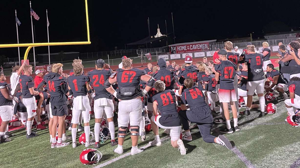 American Fork players talk with their coach after a 28-0 shut out win over Bingham on Sept. 8, 2023.