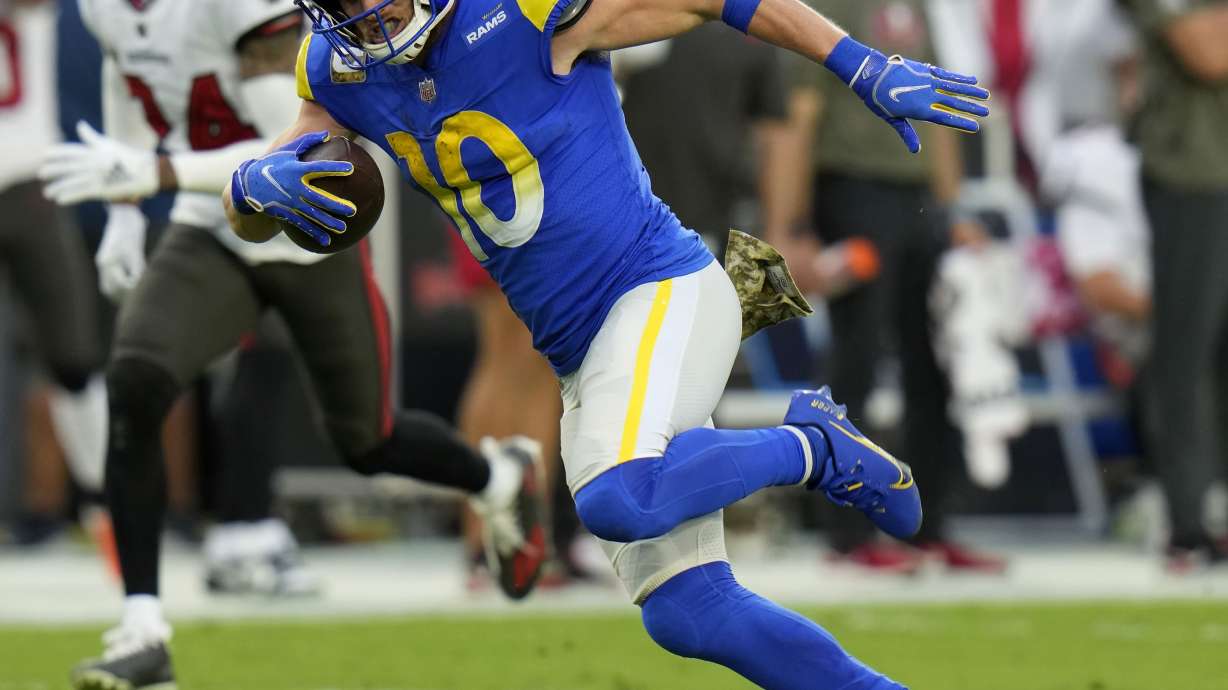 FILE - Los Angeles Rams wide receiver Cooper Kupp (10) runs to the end zone for a 69-yard touchdown reception during the first half of an NFL football game against the Tampa Bay Buccaneers, Nov. 6, 2022, in Tampa, Fla. Kupp, the 2021 Super Bowl MVP, had 75 catches for 812 yards in just nine games last year before an injury ended his season.