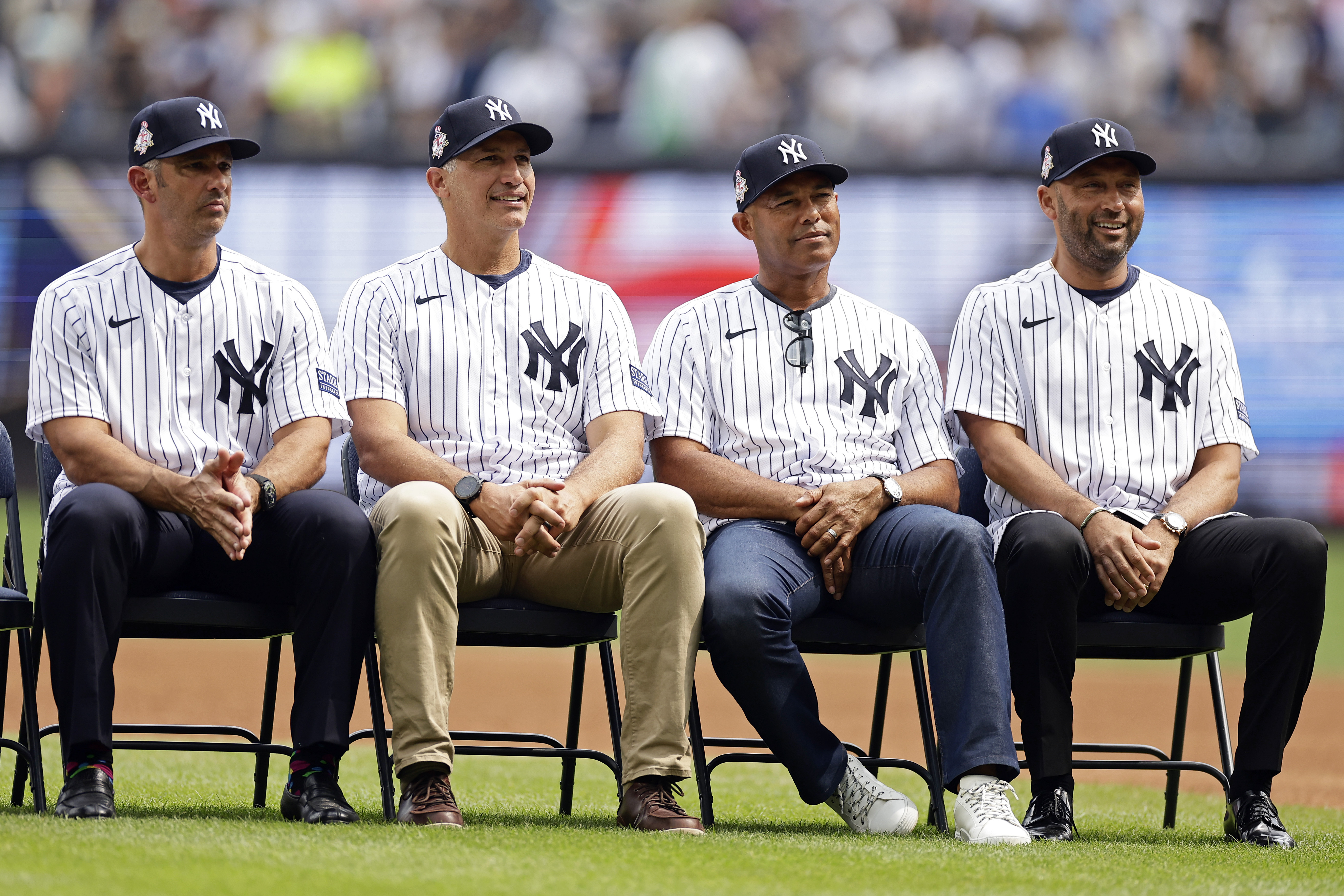 Former New York Yankees' Jorge Posada, left, Andy Pettitte, second left, Mariano Rivera and Derek Jeter, right, attend the Yankees Old-Timers' Day ceremony before a baseball game against the Milwaukee Brewers on Saturday, Sept. 9, 2023, in New York.