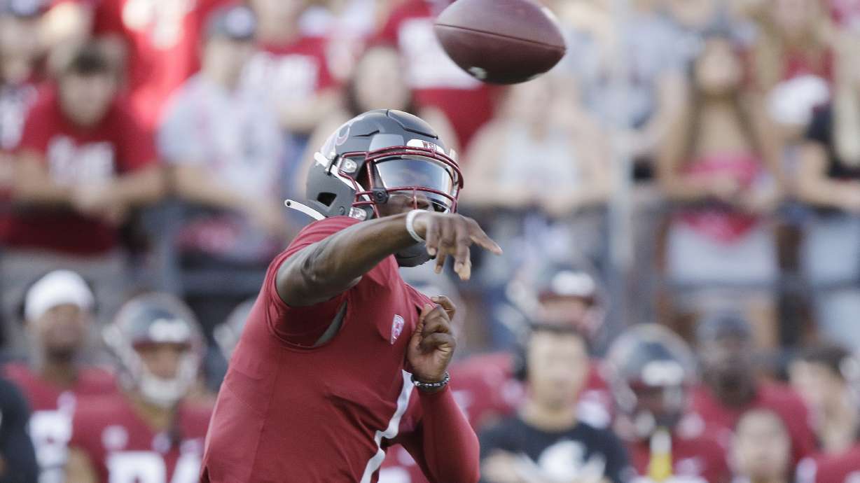 Washington State quarterback Cameron Ward throws a pass during the first half of an NCAA college football game against Wisconsin, Saturday, Sept. 9, 2023, in Pullman, Wash.