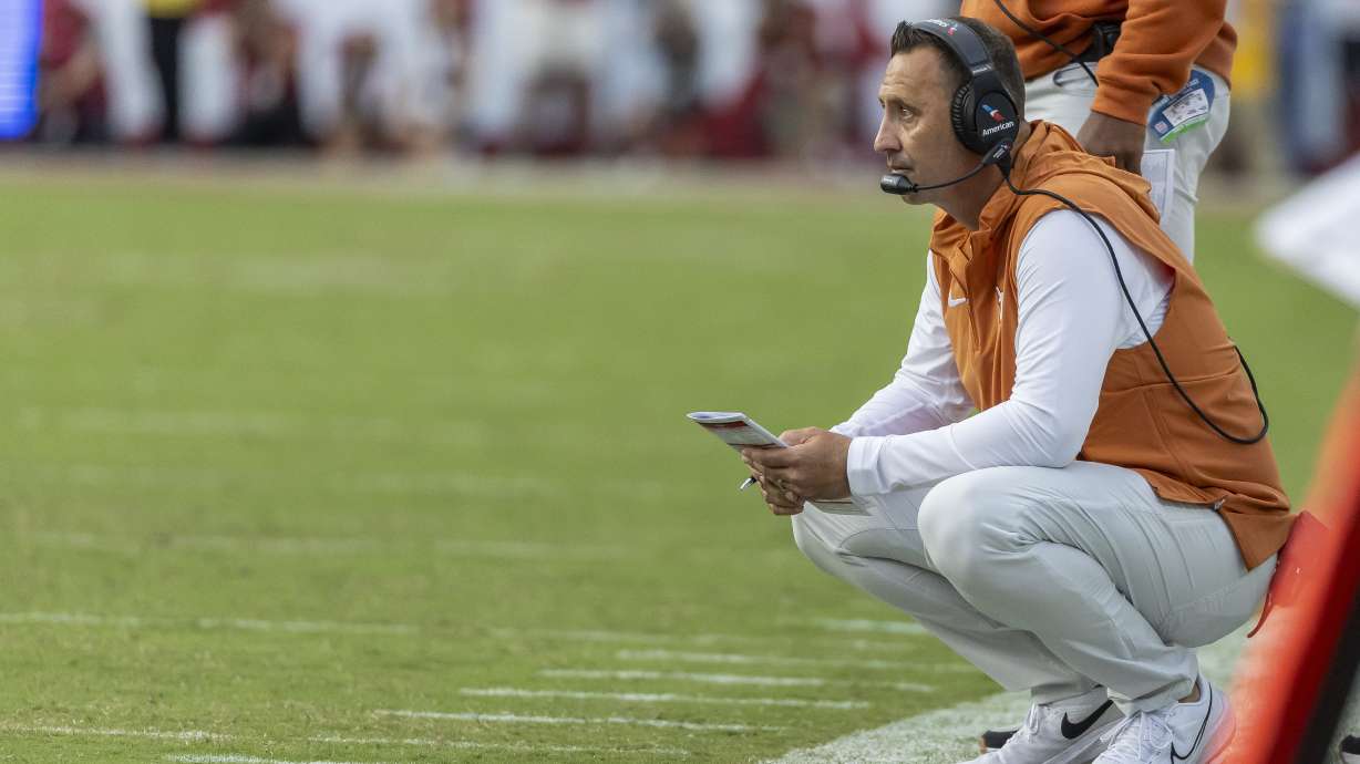 Texas head coach Steve Sarkisian tracks his team from the sidelines during the first half of an NCAA college football game against Alabama, Saturday, Sept. 9, 2023, in Tuscaloosa, Ala.