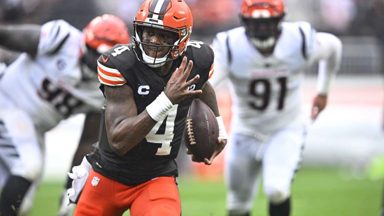 Cleveland Browns quarterback Deshaun Watson (4) runs for a touchdown against the Cincinnati Bengals during the first half of an NFL football game Sunday, Sept. 10, 2023, in Cleveland.