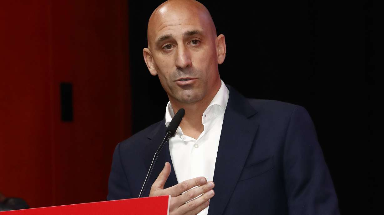 FILE - The president of the Spanish soccer federation Luis Rubiales speaks during an emergency general assembly meeting in Las Rozas, Spain, Friday Aug. 25, 2023. The kiss by Luis Rubiales has unleashed a storm of fury over gender equality that almost marred the unprecedented victory but now looks set to go down as a milestone in both Spanish soccer history but also in women's rights.