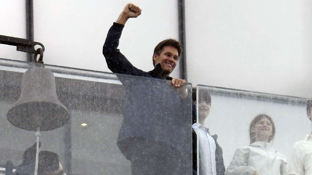 Former NFL quarterback Tom Brady, center, gestures from the lighthouse at Gillette Stadium prior to an NFL football game between the Philadelphia Eagles and the New England Patriots, Sunday, Sept. 10, 2023, in Foxborough, Mass.
