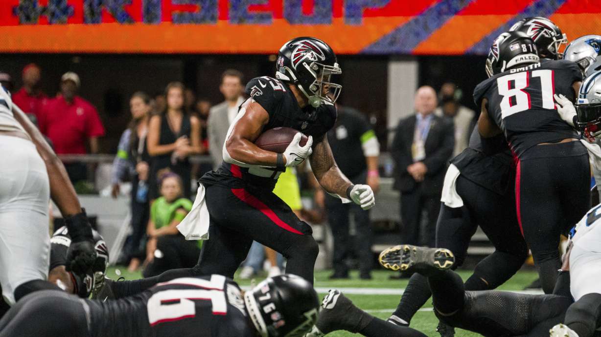 Atlanta Falcons running back Tyler Allgeier (25) runs the ball towards the end zone for a touchdown during the second half of an NFL football game against the Carolina Panthers, Sunday, Sep. 10, 2023, in Atlanta. The Atlanta Falcons won 24-10.