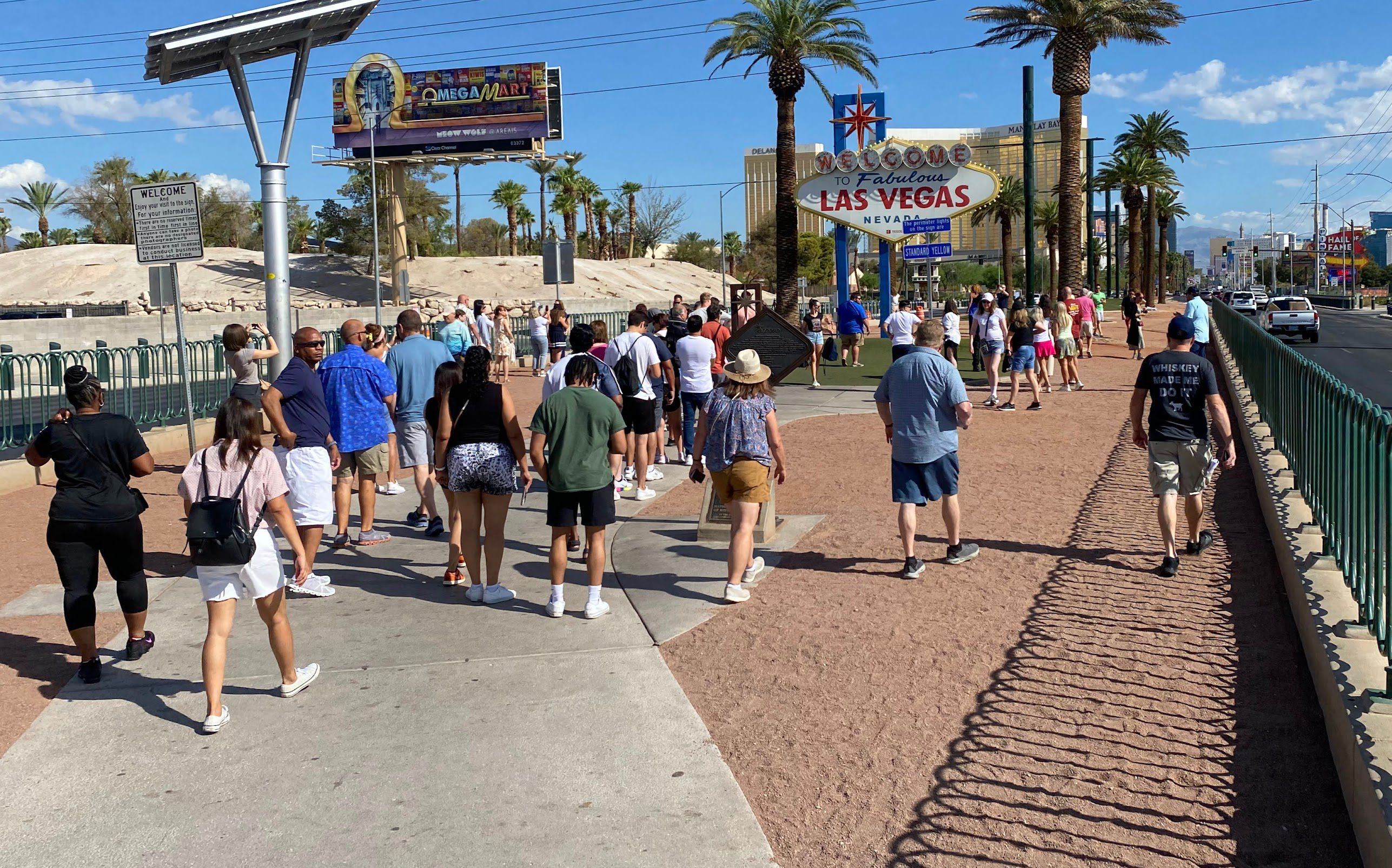 Crowds gather and are already lined up at the “Welcome to Fabulous Las Vegas” sign, this time at 8:45 a.m. on a recent weekday in Las Vegas. The sign is owned by Utah sign company YESCO.