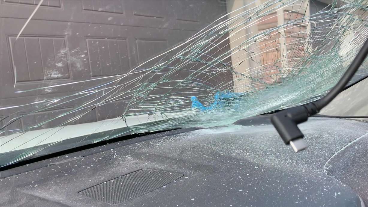The aftermath of a chair hitting the windshield of the Eaton family's car on Saturday is shown.