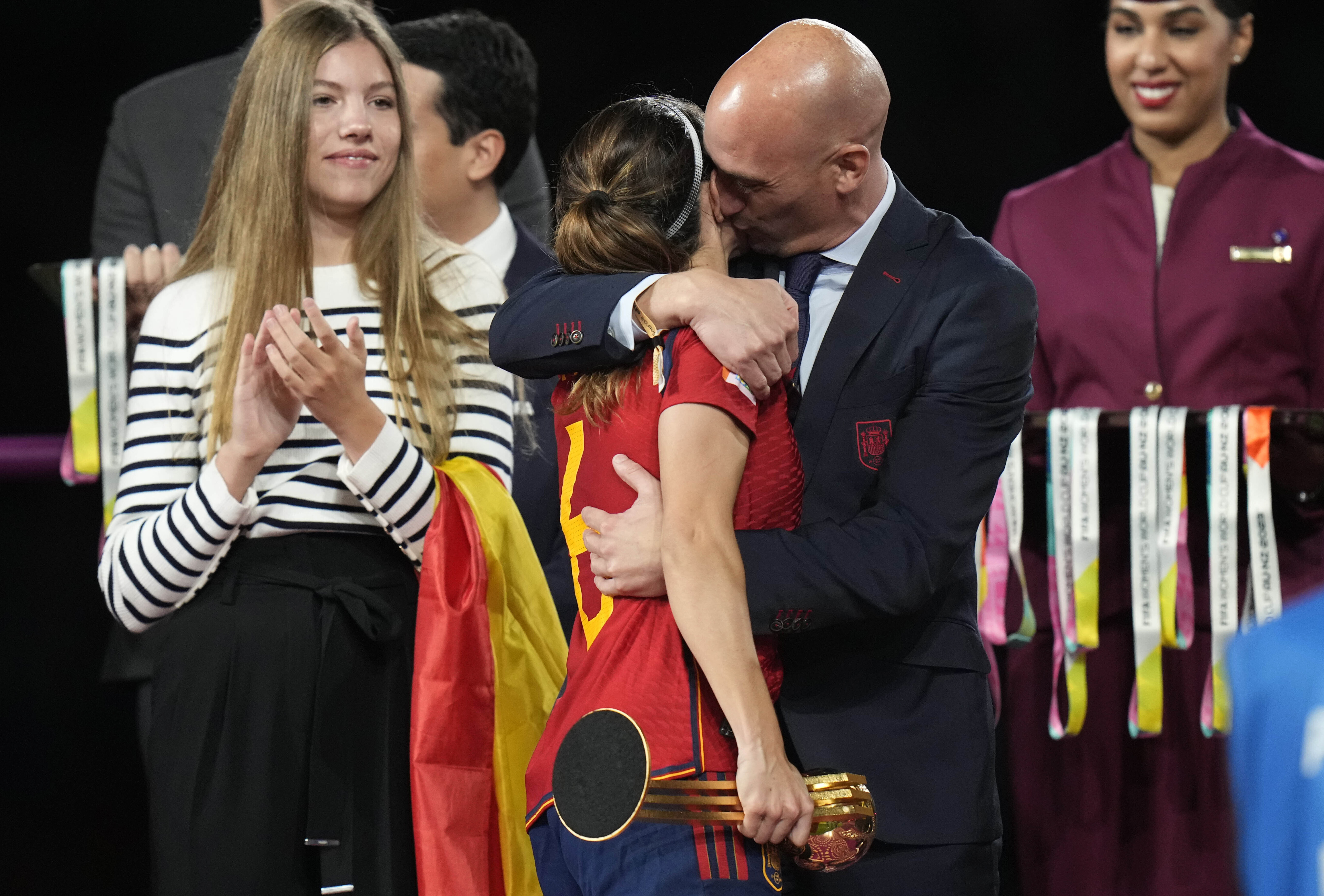 FILE - President of Spain's soccer federation, Luis Rubiales, right, hugs Spain's Aitana Bonmati on the podium following Spain's win in the final of Women's World Cup soccer against England at Stadium Australia in Sydney, Australia, Sunday, Aug. 20, 2023. Rubiales has resigned, Sunday, Sept. 10, 2023, from his post after a kiss scandal which tarnished Spain's victory at the Women's World Cup. 
