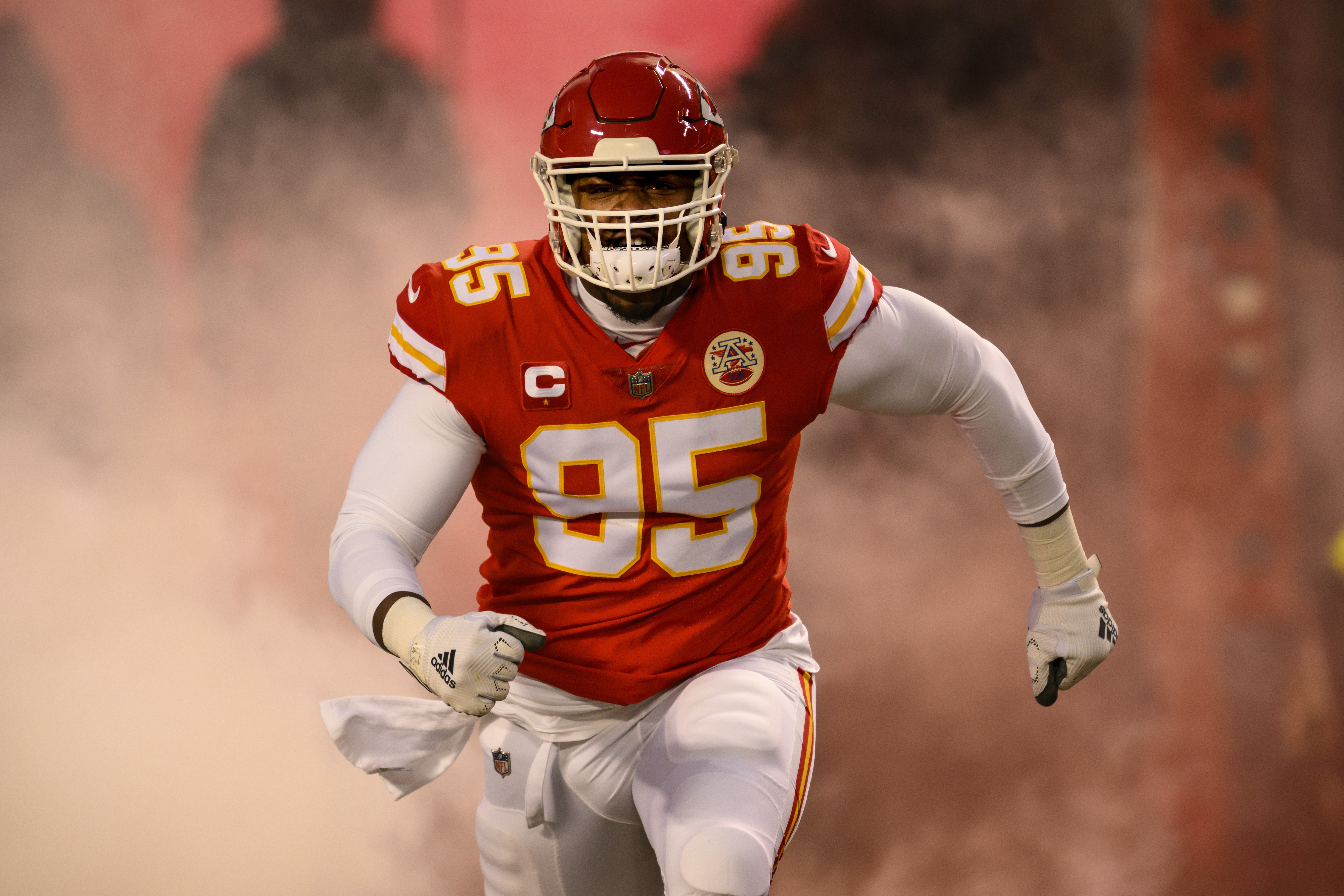 FILE - Kansas City Chiefs defensive tackle Chris Jones comes onto the field during introductions before playing the Cincinnati Bengals in the NFL AFC Championship playoff football game, Sunday, Jan. 29, 2023 in Kansas City, Mo. The negotiations between the Kansas City Chiefs and Chris Jones appear to be getting more contentious by the day, and chances are growing that the Super Bowl champions will begin their title defense without the All-Pro defensive tackle.