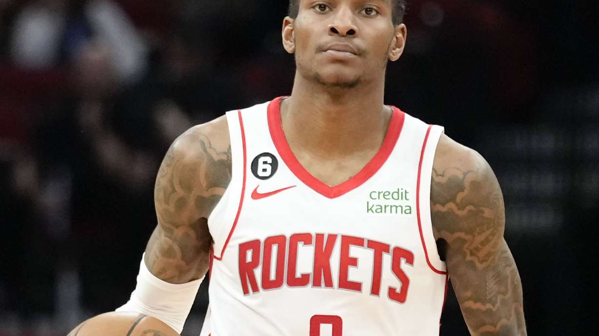 FILE - Houston Rockets guard Kevin Porter Jr. dribbles during the second half of an NBA basketball game against the Brooklyn Nets, March 7, 2023, in Houston. Porter was arrested Monday, Sept. 11, 2023, and charged with assault and strangulation after allegedly attacking his girlfriend at a New York City hotel.