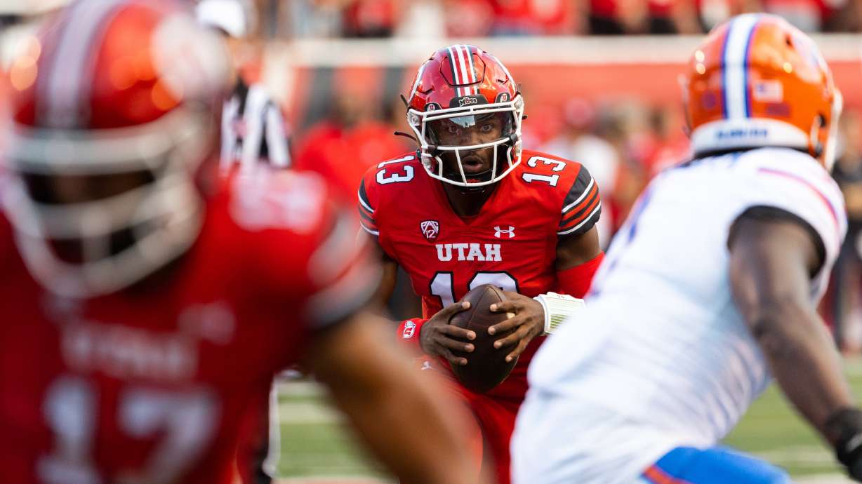 Utah Utes quarterback Nate Johnson (13) plays during the season opener at Rice-Eccles Stadium in Salt Lake City on Thursday, Aug. 31, 2023.