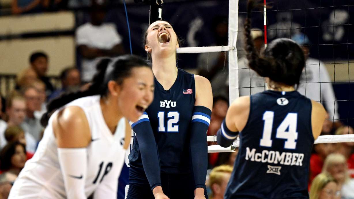 BYU’s Claire Little, celebrates after scoring a point as they and Utah play a volleyball match in Provo on Wednesday, Sept. 13, 2023. BYU won 3-1