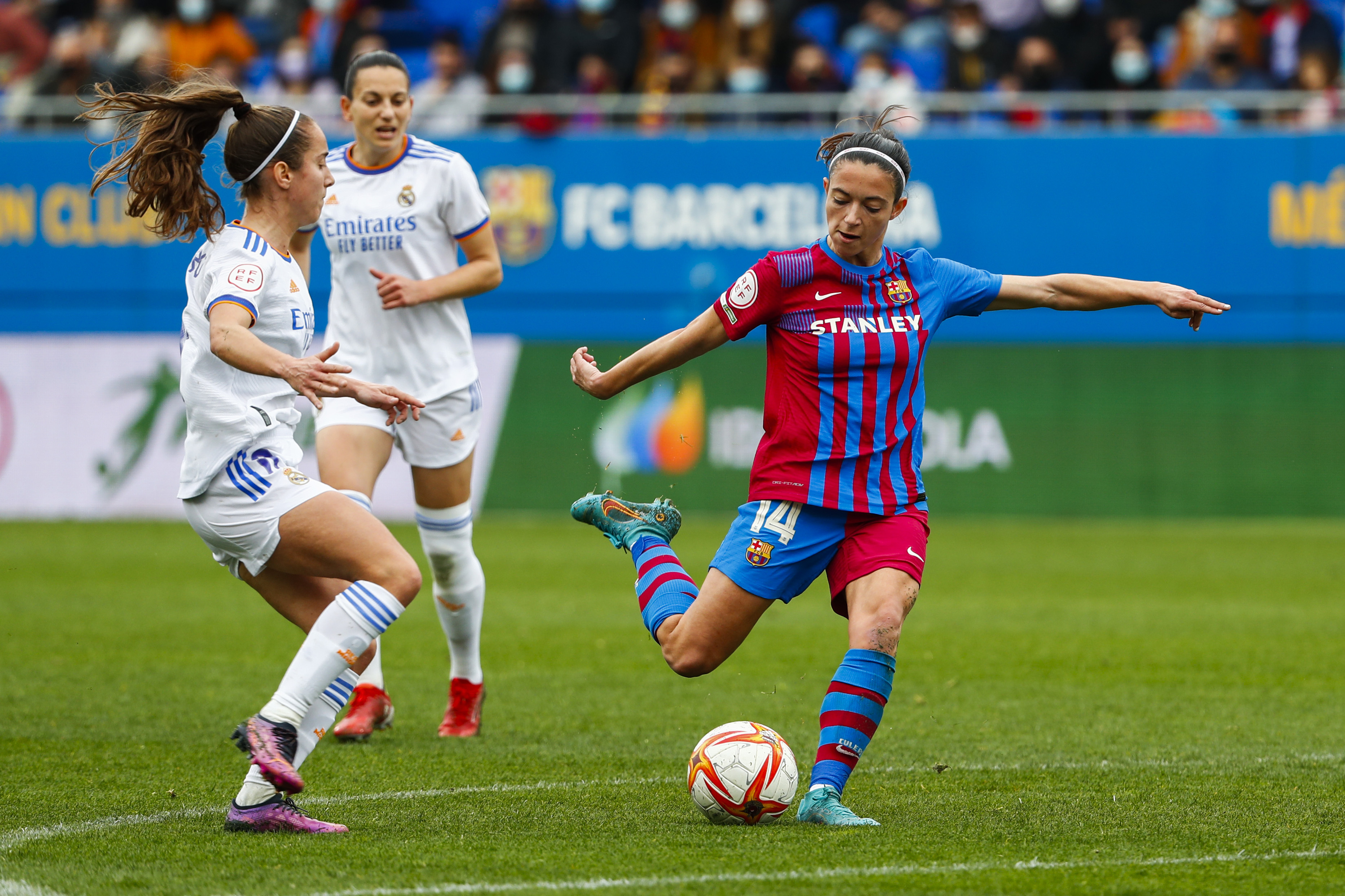 FILE - Barcelona's Aitana Bonamati, right, shoots the ball next to Real Madrid's Maite Oroz during the Women's Spanish La Liga soccer match between FC Barcelona and Real Madrid in Barcelona, Spain, Sunday, March 13, 2022. The players for Spain's women's league maintain they'll go on strike rather than start the new season after salary negotiations with the league broke down on Thursday, Sept. 7, 2024. 