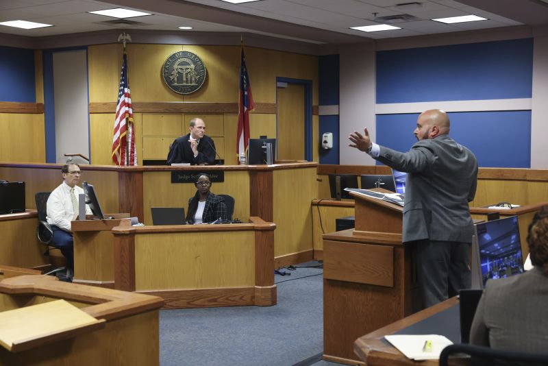 Attorney Scott Grubman, who is defending Kenneth Chesebro, argues before Fulton County Superior Judge Scott McAfee in Atlanta on Sept. 6. McAfee has ruled that former President Donald Trump and 16 others will be tried separately from two defendants who are set to go to trial next month.