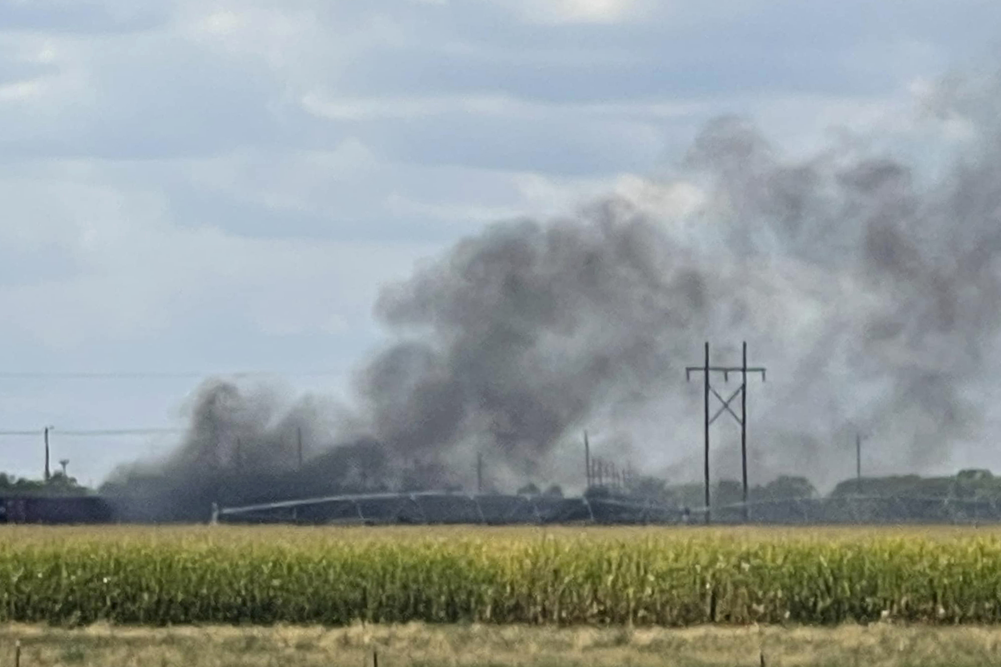 Smoke rises after an explosion at Union Pacific's Bailey Yard in North Platte, Nebraska, on Thursday. The explosion inside a shipping container generated toxic smoke and forced evacuations.