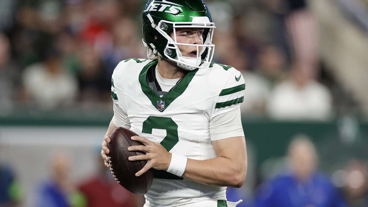 New York Jets quarterback Zach Wilson (2) looks to pass against the Buffalo Bills during the second quarter of an NFL football game, Monday, Sept. 11, 2023, in East Rutherford, N.J.