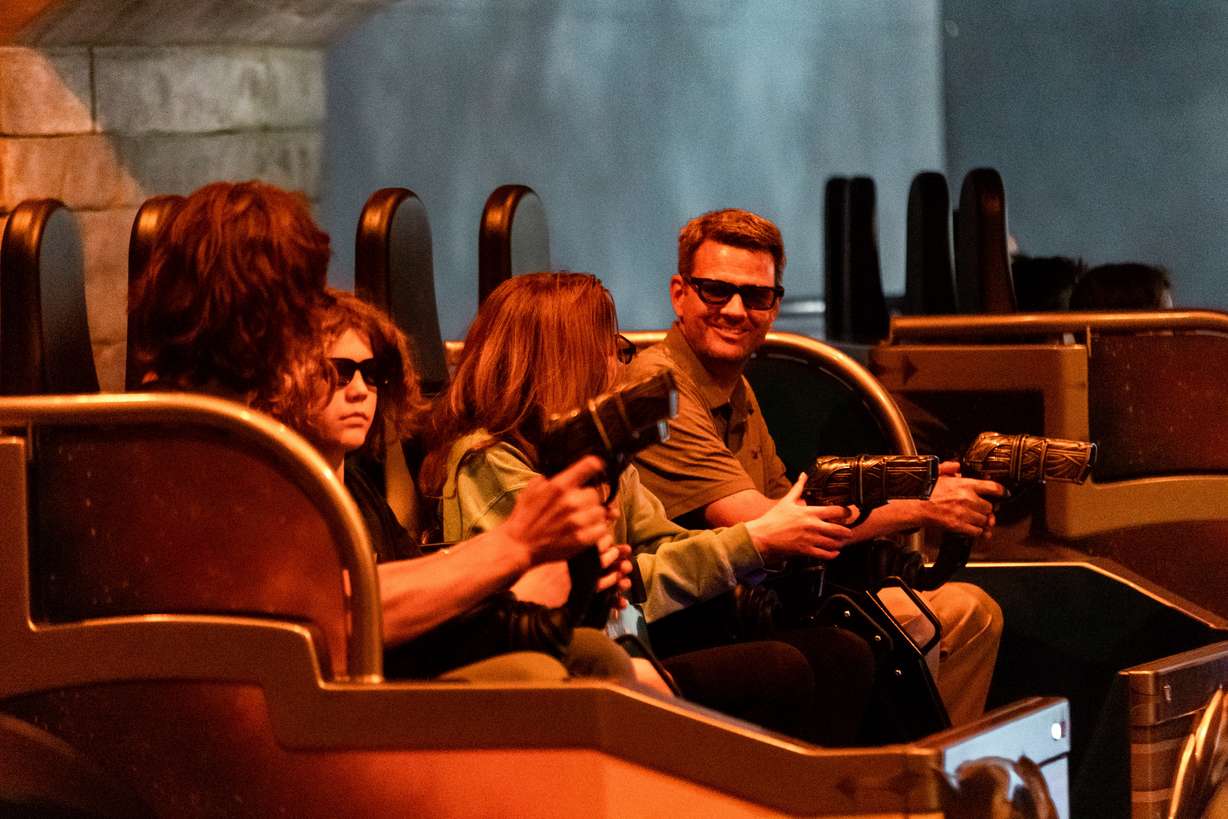 The first riders ride Lagoon’s new ride, Primordial, on its opening day at the amusement park in Farmington on Friday, Sept. 15, 2023.