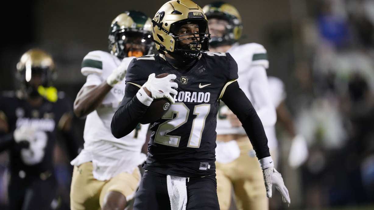 Colorado safety Shilo Sanders returns an interception for a touchdown in the first half of an NCAA college football game against Colorado State, Saturday, Sept. 16, 2023, in Boulder, Colo.