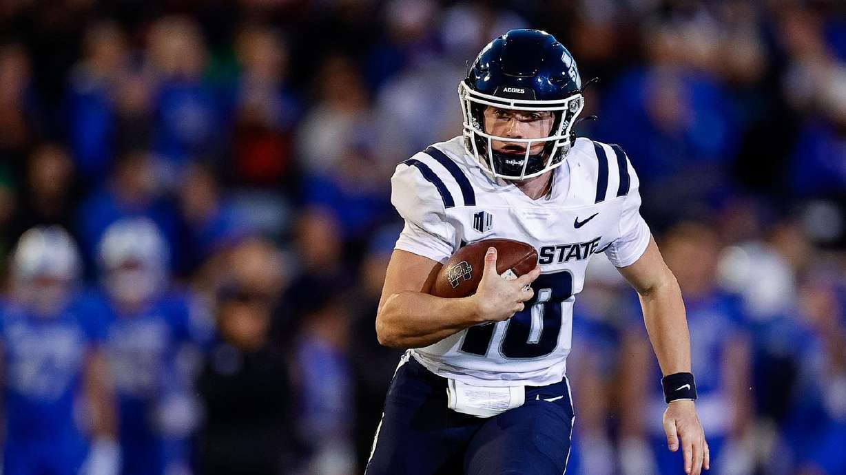 Utah State Aggies quarterback McCae Hillstead (10) runs the ball in the second quarter against the Air Force Falcons at Falcon Stadium.
