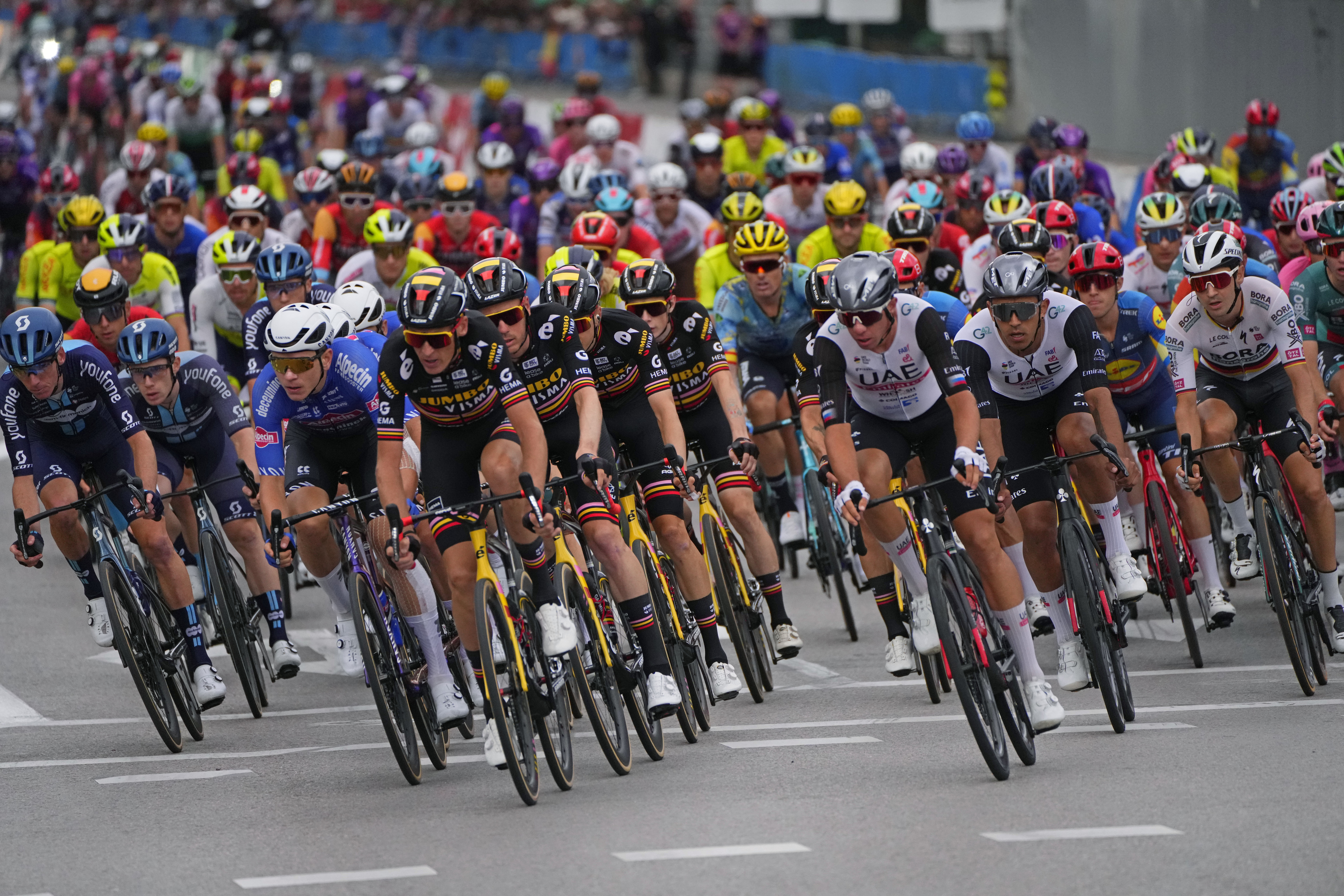 Cyclists compete during the 21st stage of the Vuelta cycling race between Hipodromo de La Zarzuela and Madrid, Spain, Sunday, Sept. 17, 2023. 