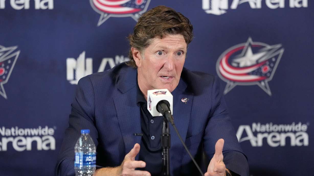 FILE - New Columbus Blue Jackets NHL hockey head coach Mike Babcock speaks to the media during an introductory press conference Saturday, July 1, 2023, in Columbus, Ohio. Babcock and Boone Jenner blasted comments made on a hockey podcast about the new Columbus Blue Jackets coach asking the captain to show him photos on his phone.