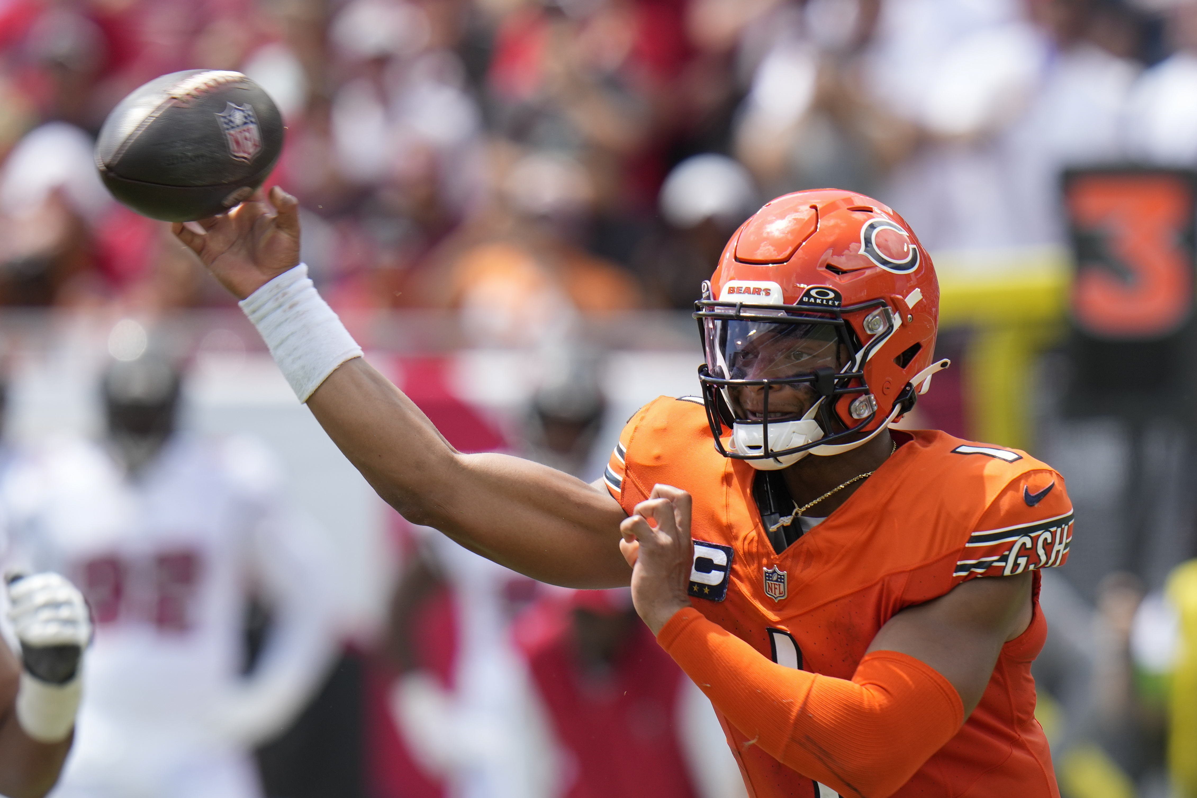 Chicago Bears quarterback Justin Fields (1) throws a pass during the first half of an NFL football game against the Tampa Bay Buccaneers, Sunday, Sept. 17, 2023, in Tampa, Fla.