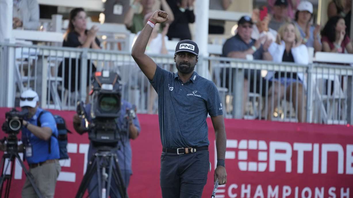 Sahith Theegala reacts on the 18th green of the Silverado Resort North Course after winning the Fortinet Championship PGA golf tournament in Napa, Calif., Sunday, Sept. 17, 2023.