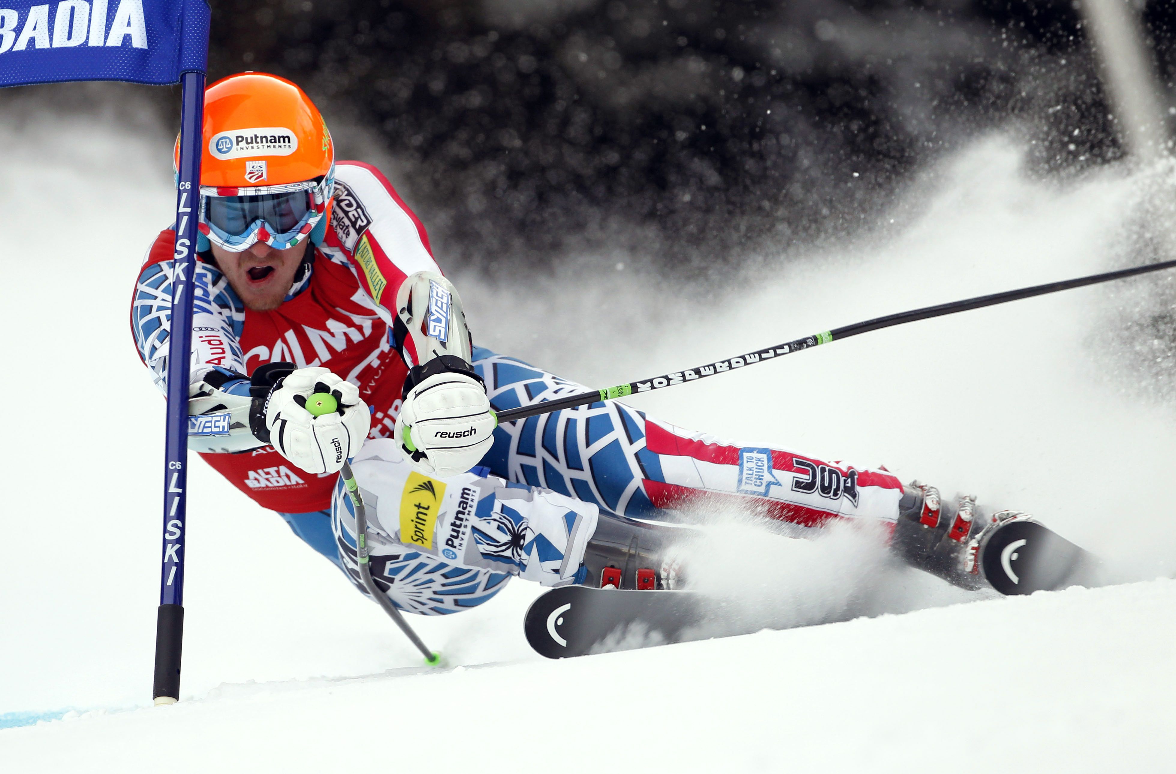 Ted Ligety of Park City, Utah, passes a gate during the first run of an alpine ski men’s World Cup giant slalom race, in Alta Badia, Italy, in this Dec. 19, 2010 photo.